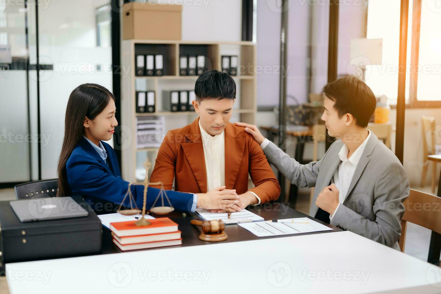 Consultation between a male lawyer and business customer, handshake after good deal agreement, Law and Legal concept.Good service cooperation photo