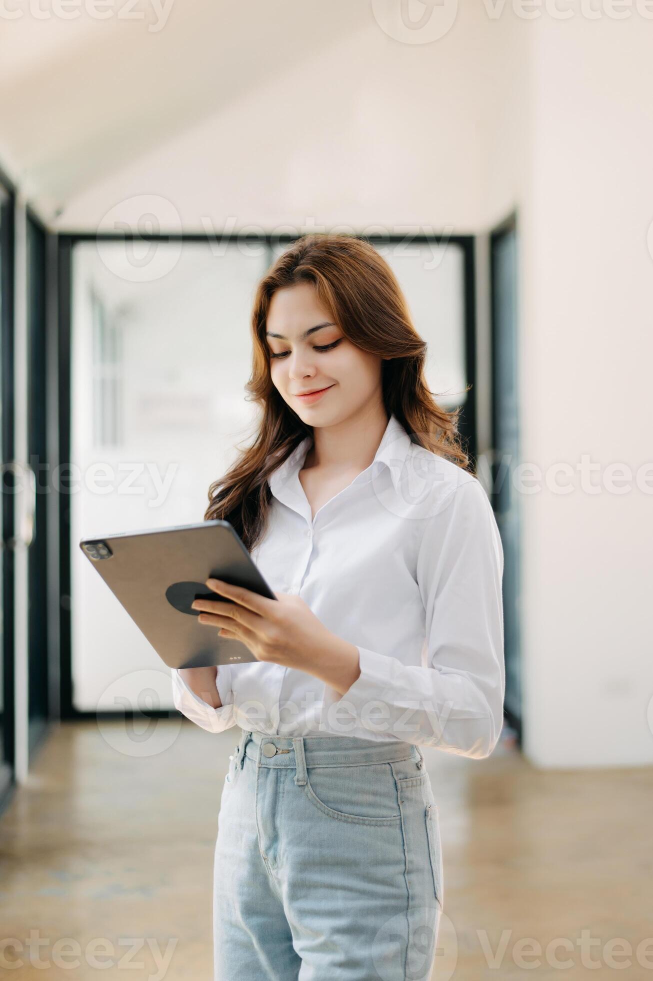 Confident business expert attractive smiling young woman holding