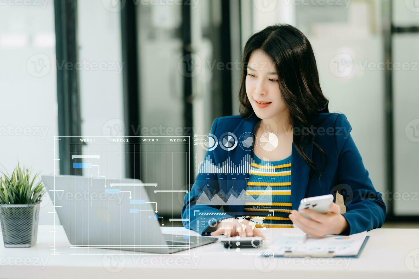Businesswoman hand Project manager working and update tasks and Gantt chart scheduling virtual diagram.with smart phone, tablet and laptop in office. photo