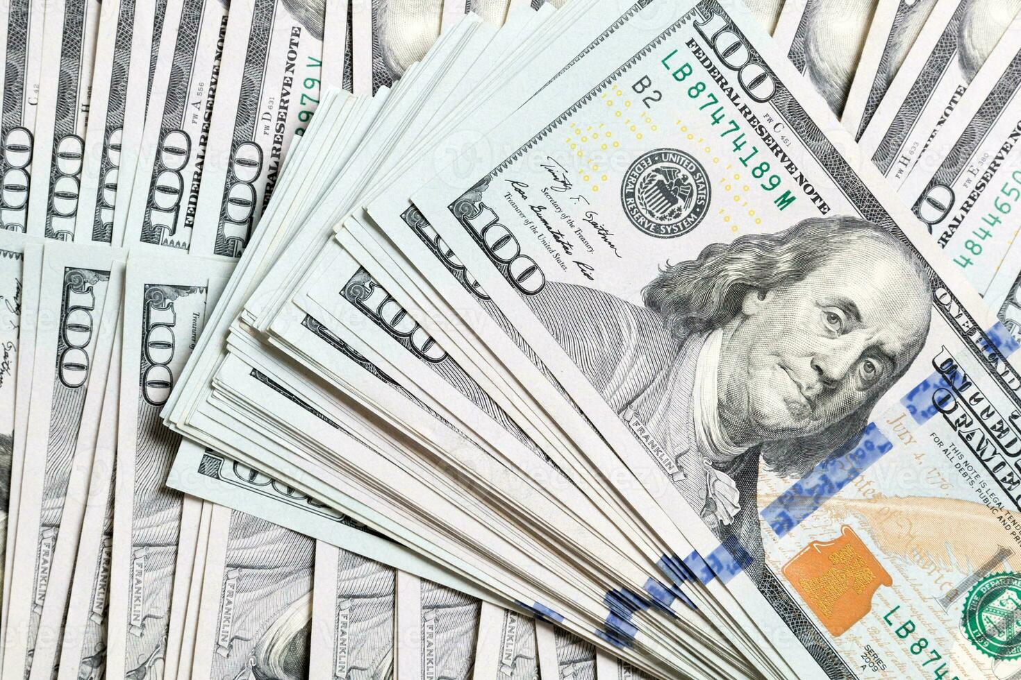 Background with money american hundred dollar bills, horizontal. Top view of business concept on background with copy space photo