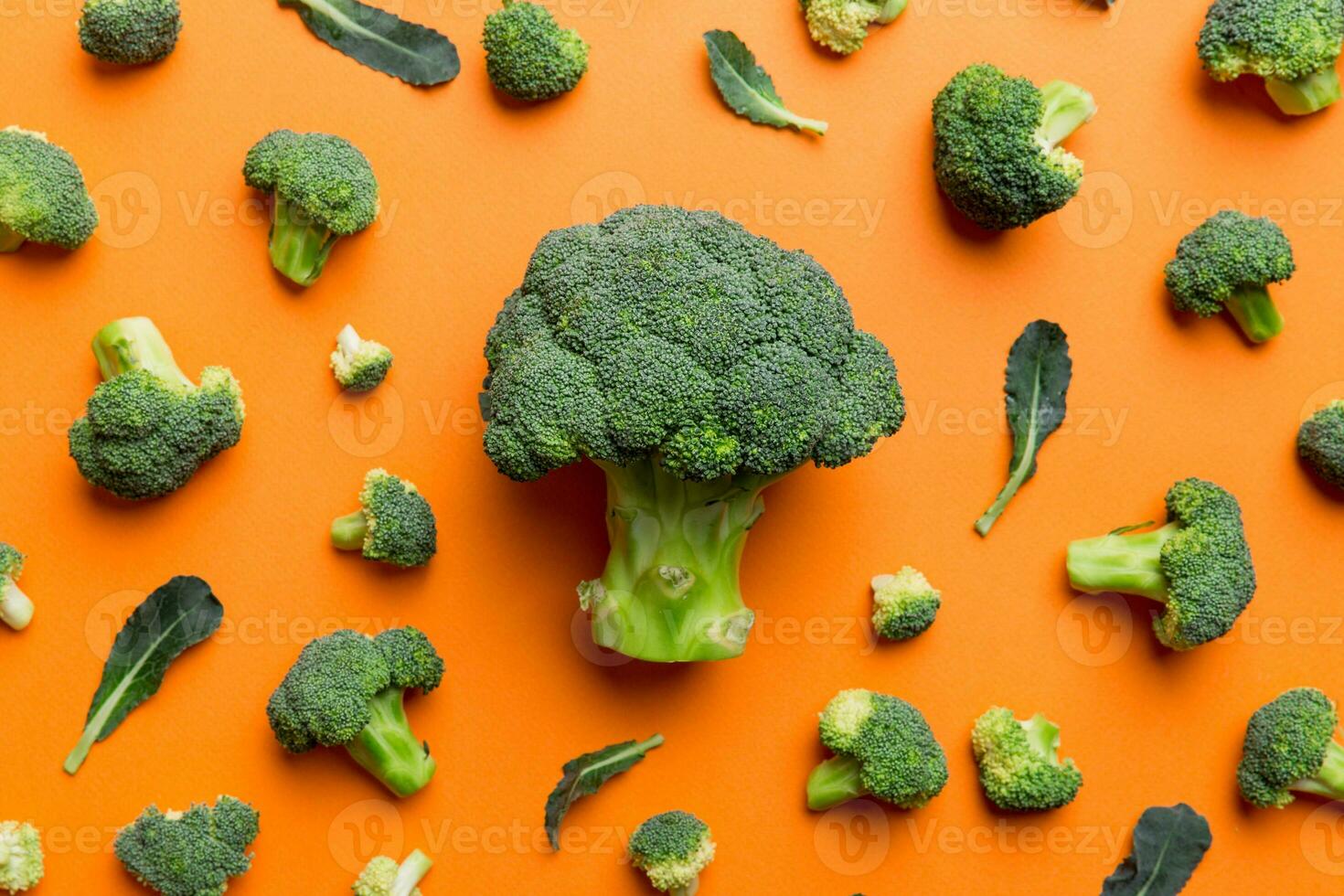 green fresh broccoli background close up on colored table. Vegetables for diet and healthy eating. Organic food photo