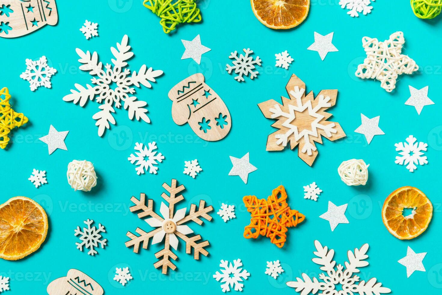 Top view of blue background with New Year toys and decorations. Christmas time concept photo