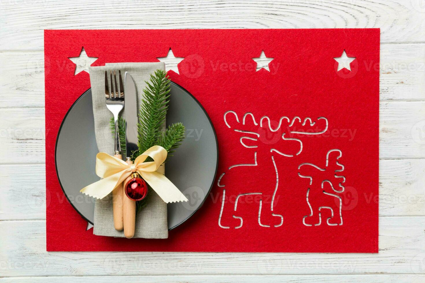 Christmas dinner background with rustic decorations and kitchen utensil . View from above photo