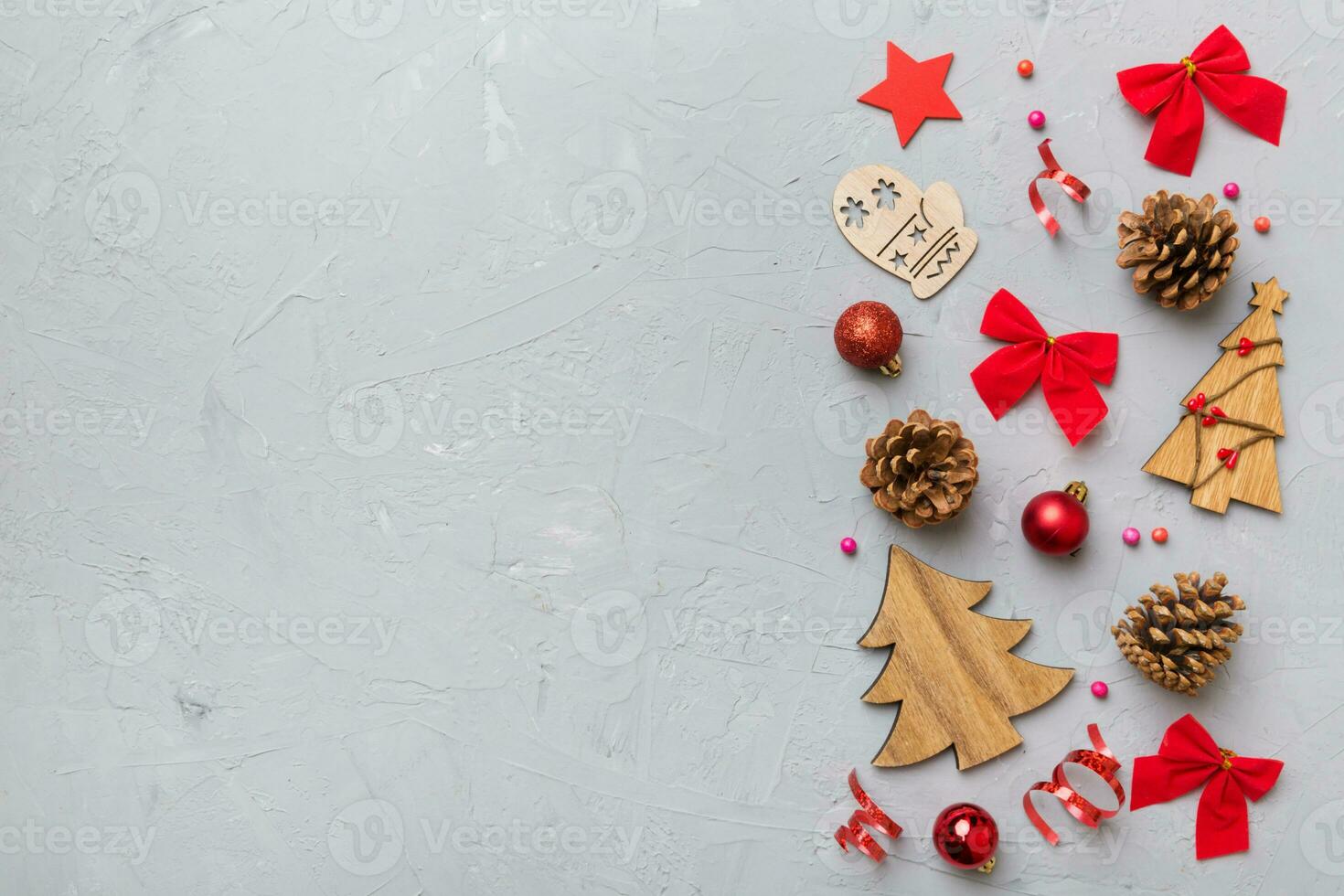 New Year composition. Christmas decor background with pine cones. Top view with copy space photo