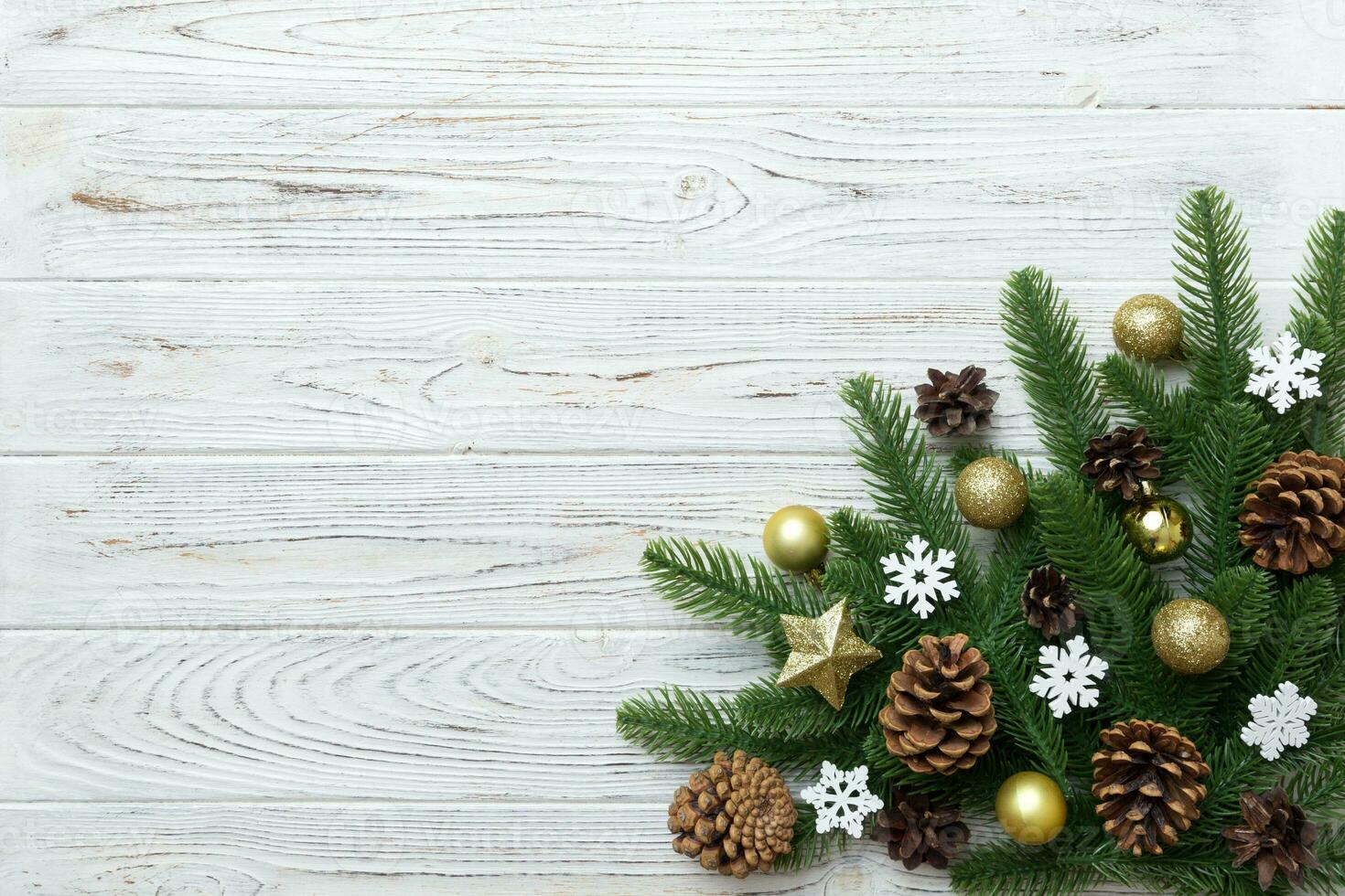 Christmas background with fir branches and Christmas decor. Top view, copy space for text photo