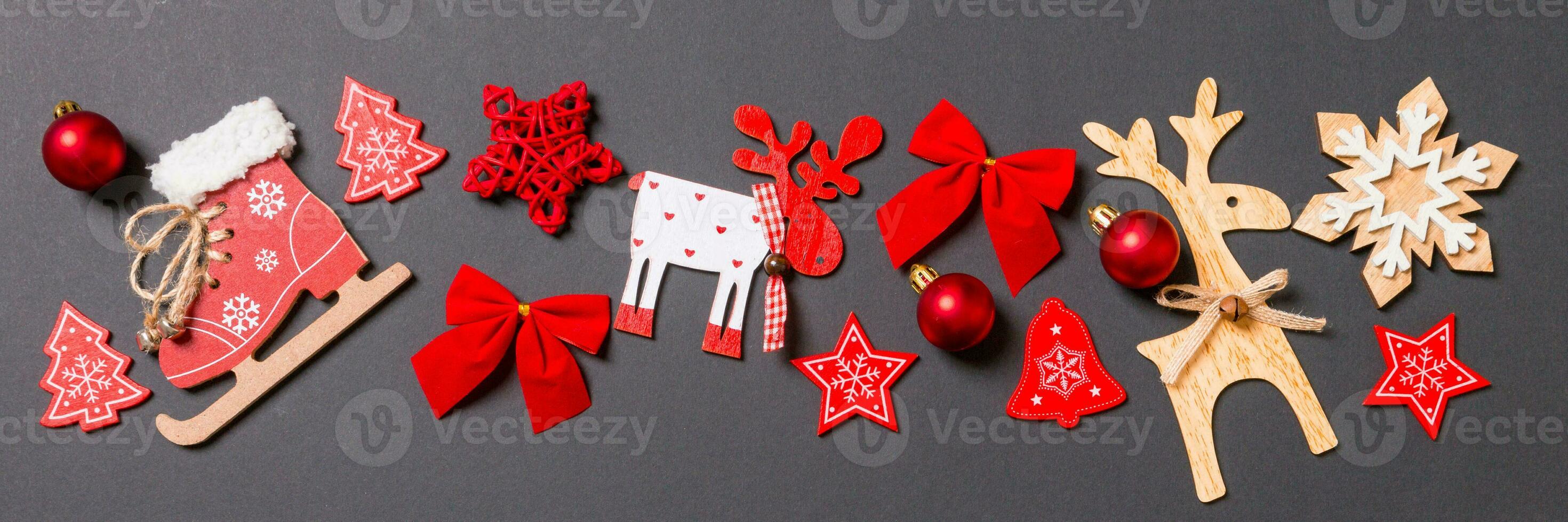 Christmas black background with holiday toys Banner and decorations. Happy New Year concept with empty space for your design photo
