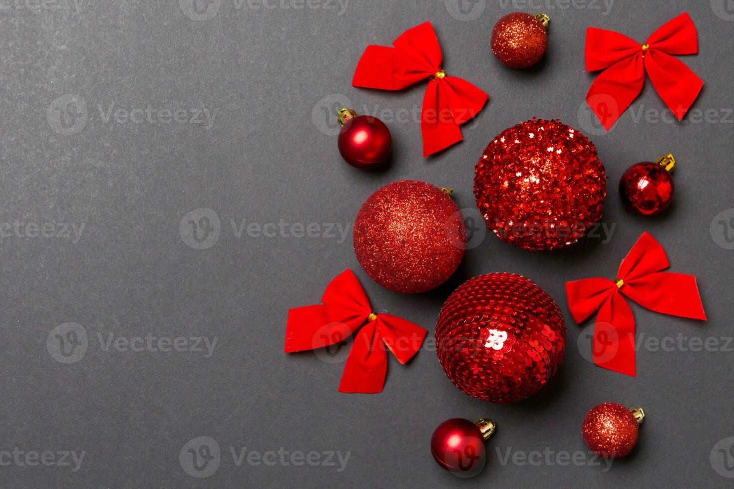 Top view of festive winter composition on colorful background with empty space for your design. Christmas baubles and decorations. New Year concept photo