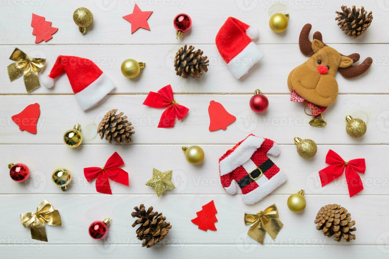 New Year composition. Christmas decor background with pine cones. Top view with copy space photo