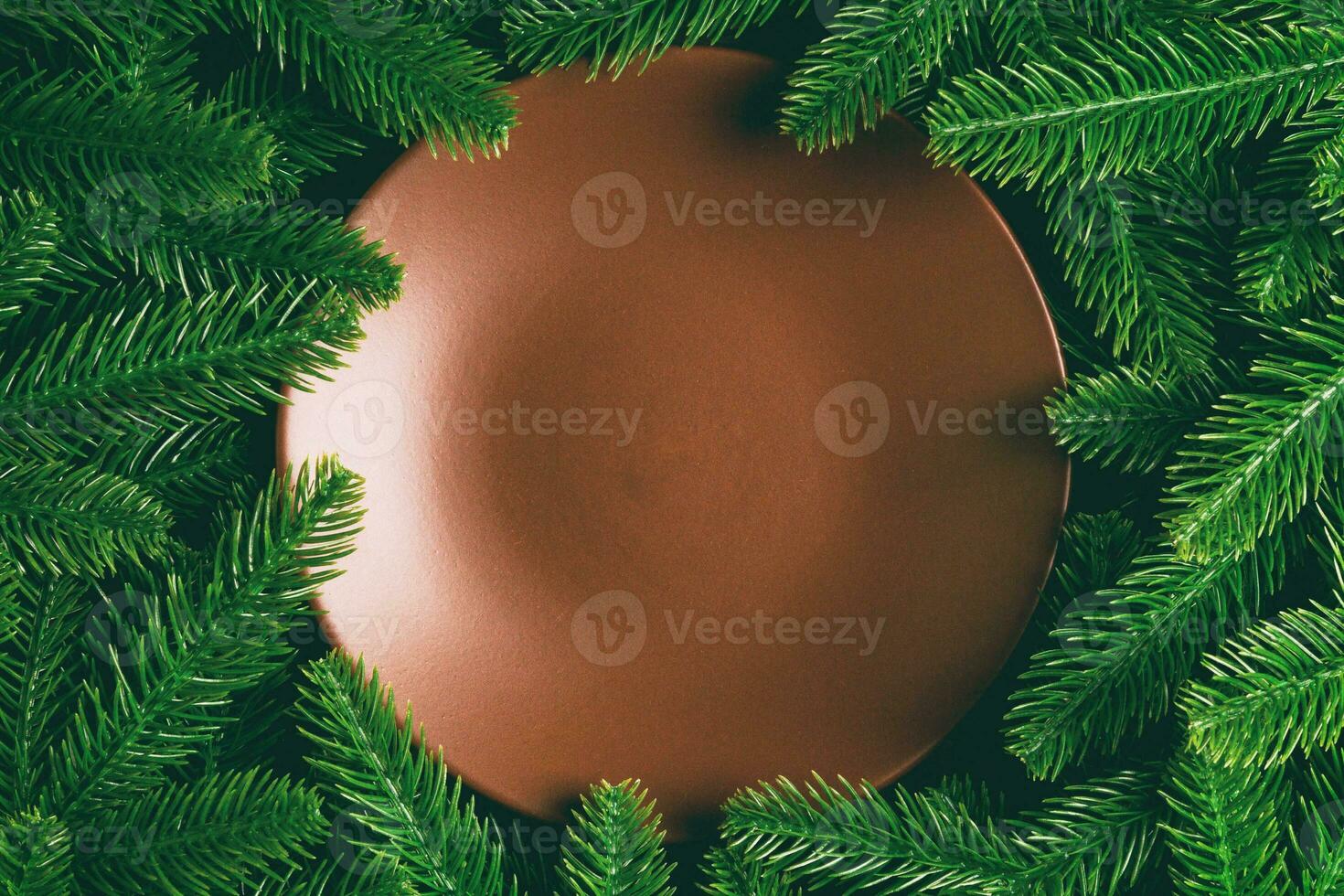 Top view served plate with green fir tree branches. Holiday dinner concept with copy space photo