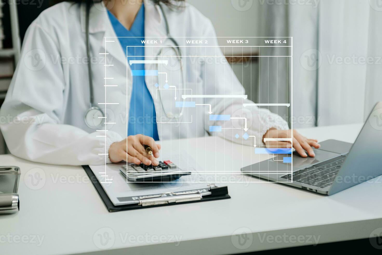 Project manager working and update tasks with Gantt chart scheduling diagram at hospital .success smart medical doctor working with smart medical doctor photo