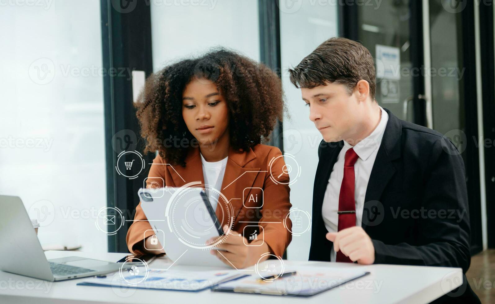 Woman accountant use Laptop and calculator to calculate the company's financial with icon banking on data network of finance and banking with business growth in office photo