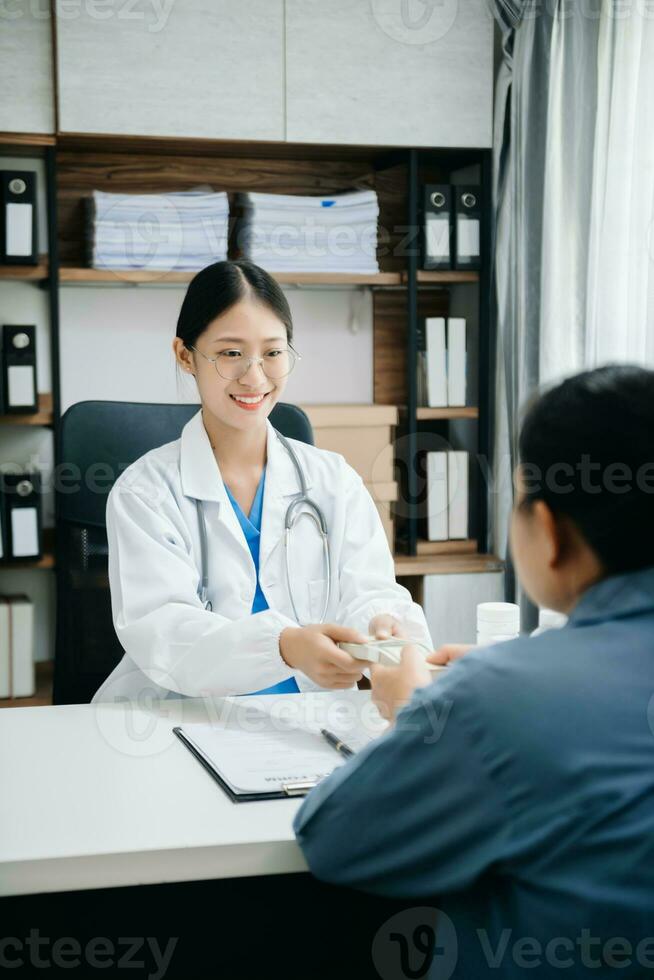 The doctor holds the patient s. hand Healthcare and medical concept. In hospital photo