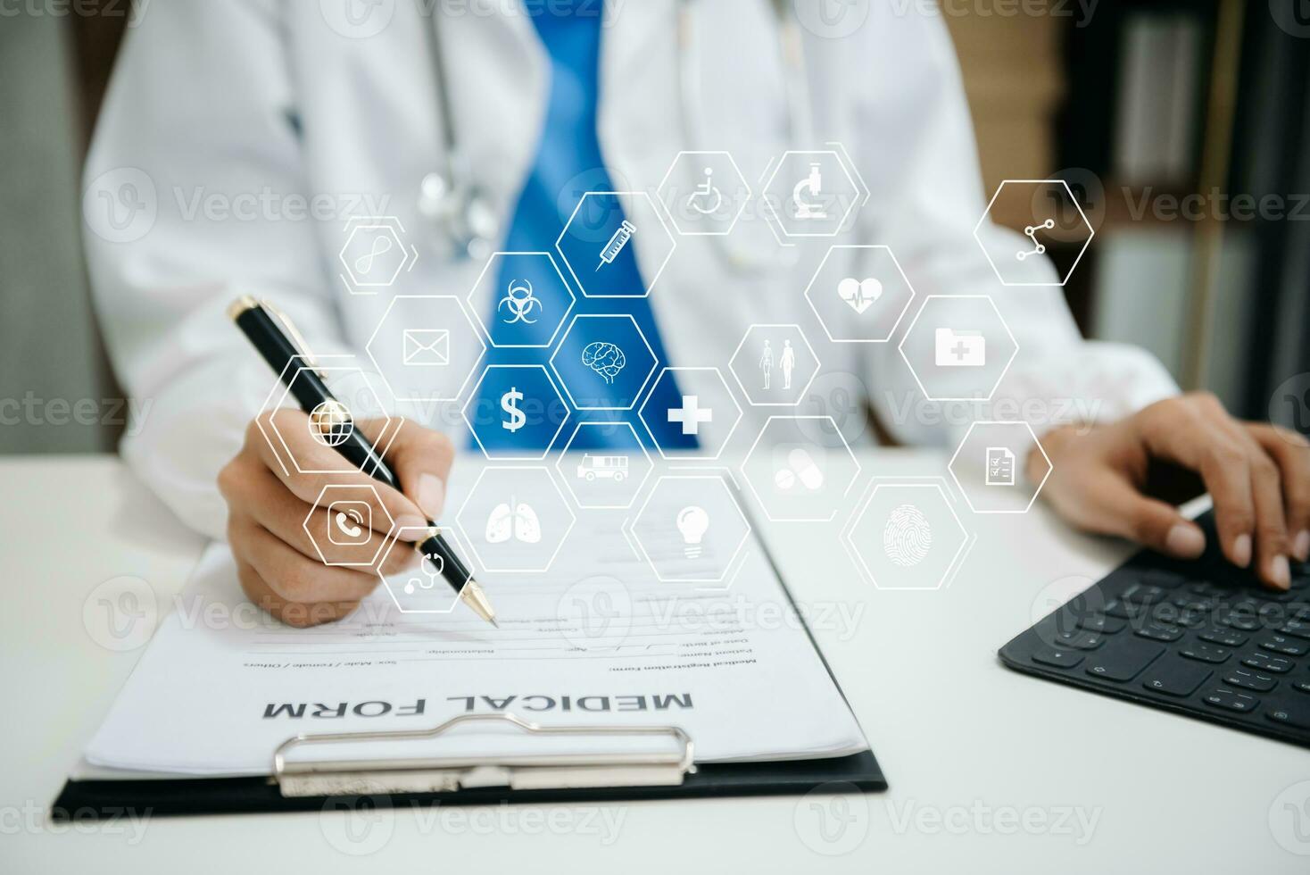 Medical technology concept. Doctor working with mobile phone and stethoscope and digital tablet laptop in office at hospital photo