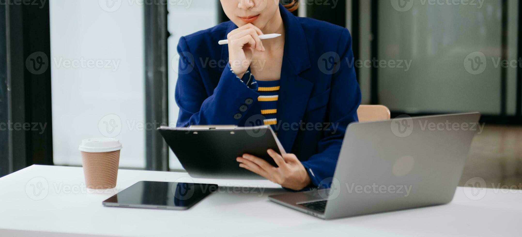 Working Process in Modern Office. Young Woman Account Manager Working at Table with New Business Project. Typing keyboard Laptop. Horizontal. photo