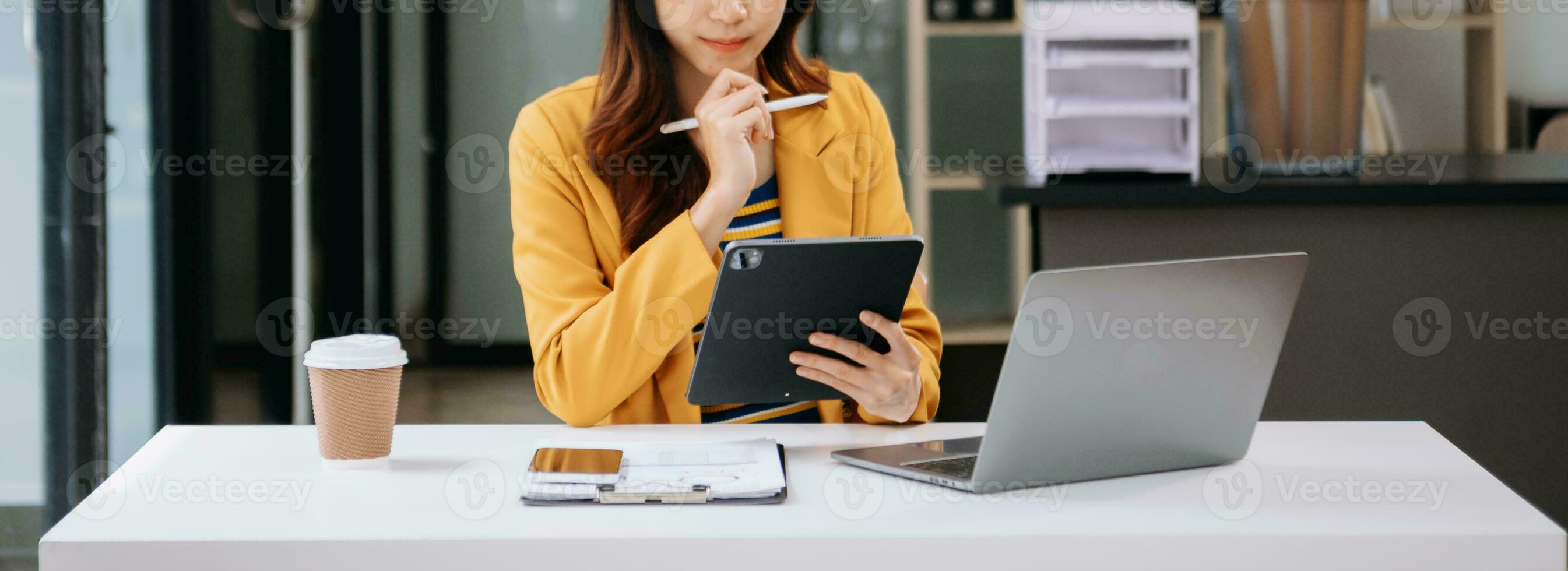 Working Process in Modern Office. Young Woman Account Manager Working at Table with New Business Project. Typing keyboard Laptop. Horizontal. photo