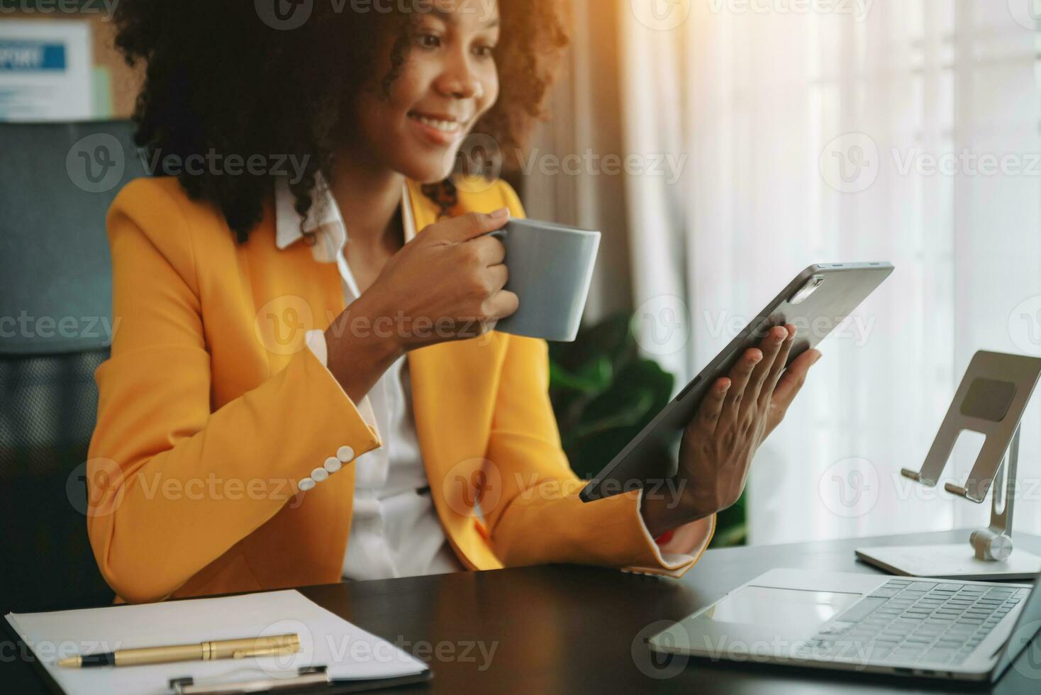 African businesswoman hand working with new modern computer using on smartphone and tablet as concept photo