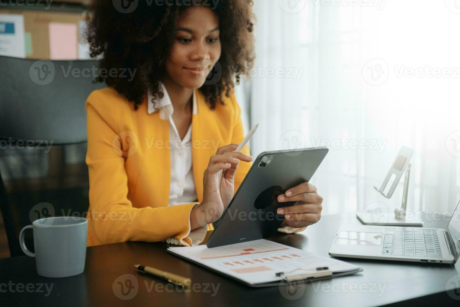 African businesswoman hand working with new modern computer using on smartphone and tablet as concept photo