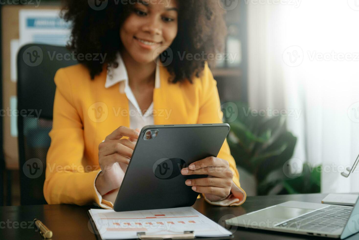 African businesswoman hand working with new modern computer using on smartphone and tablet as concept photo