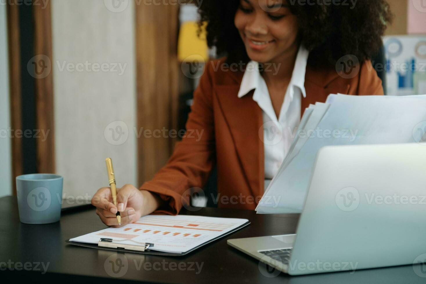 African businesswoman hand working with new modern computer using on smartphone and tablet as concept photo