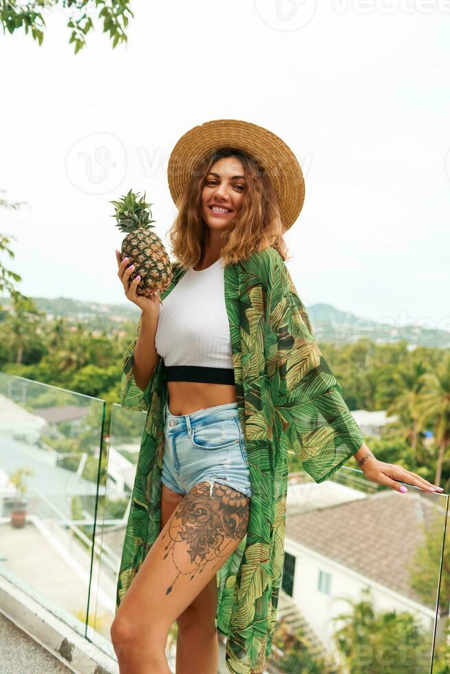 Fashion photo of pretty woman in straw hat