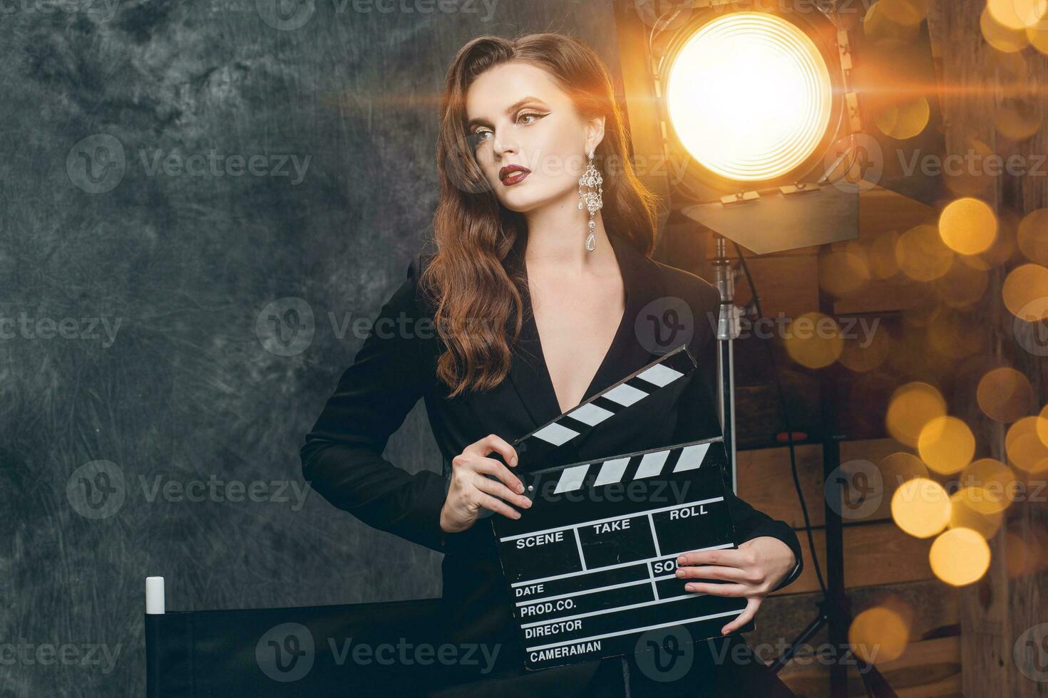 young beautiful stylish sexy woman on cinema backstage photo