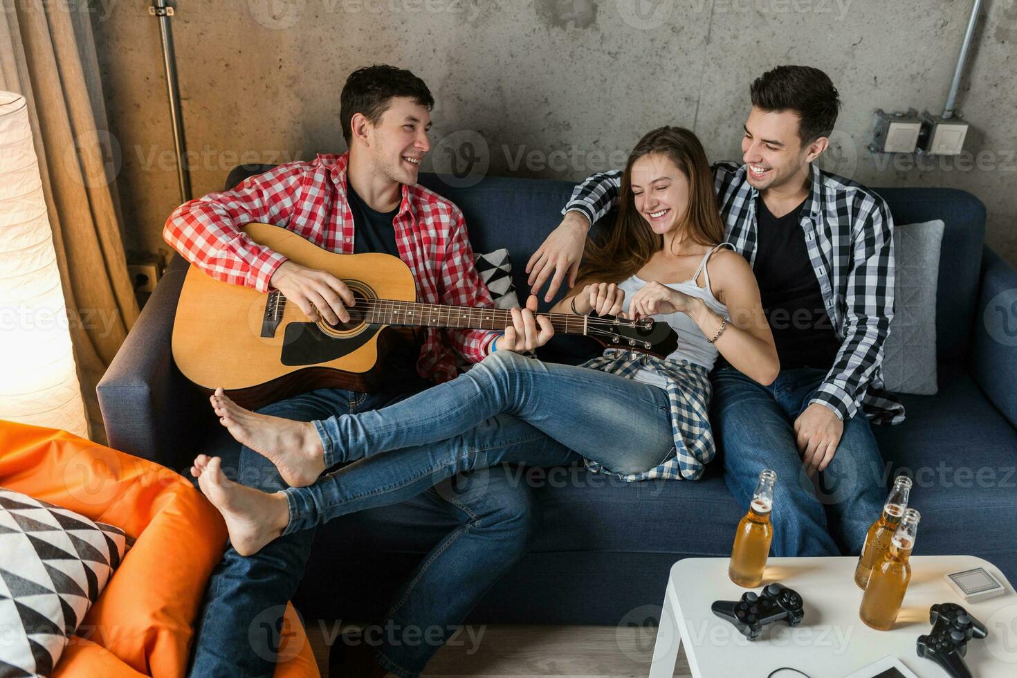 happy young people having fun, friends party at home photo