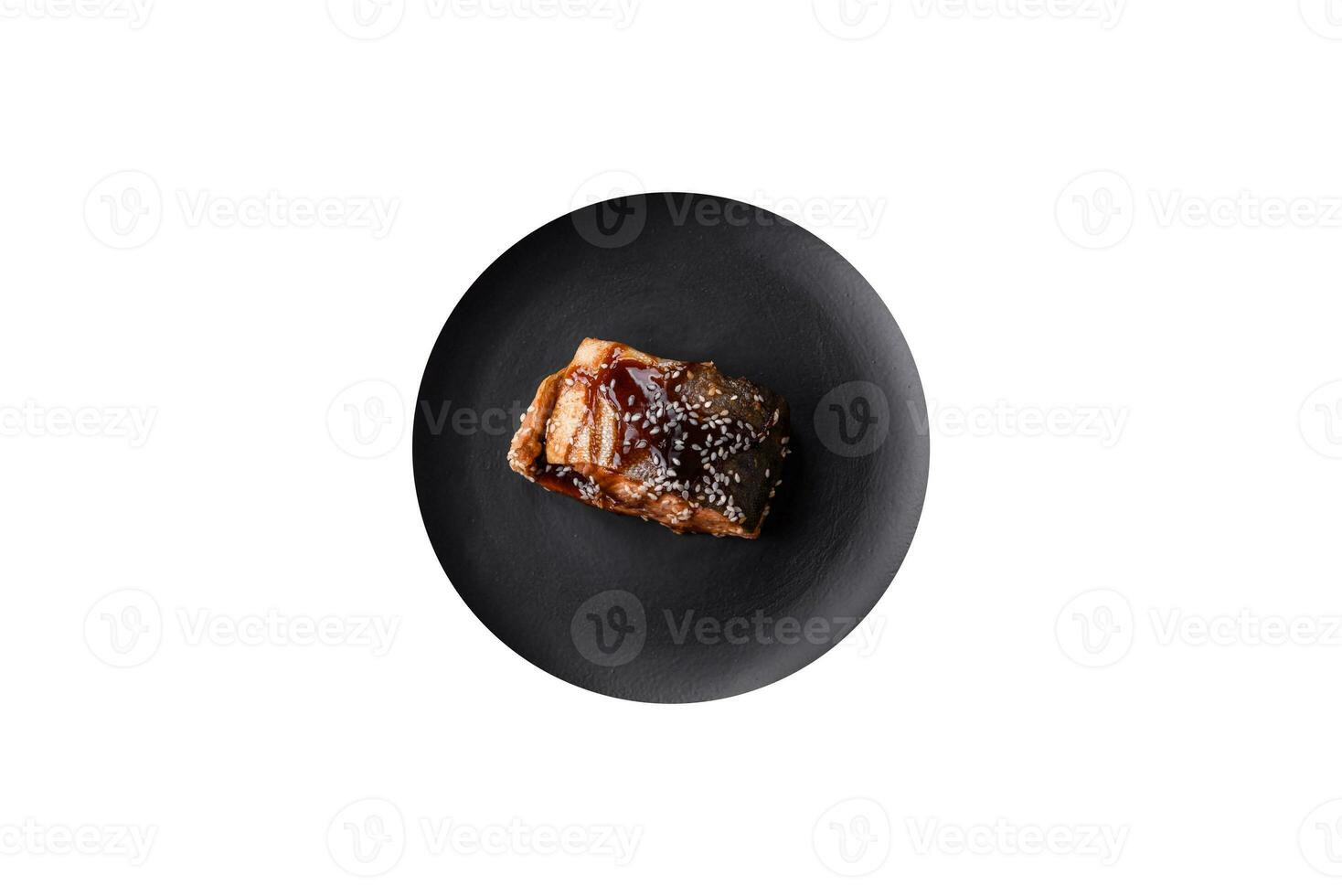 Delicious grilled salmon fillet with salt, spices, herbs and sauce photo