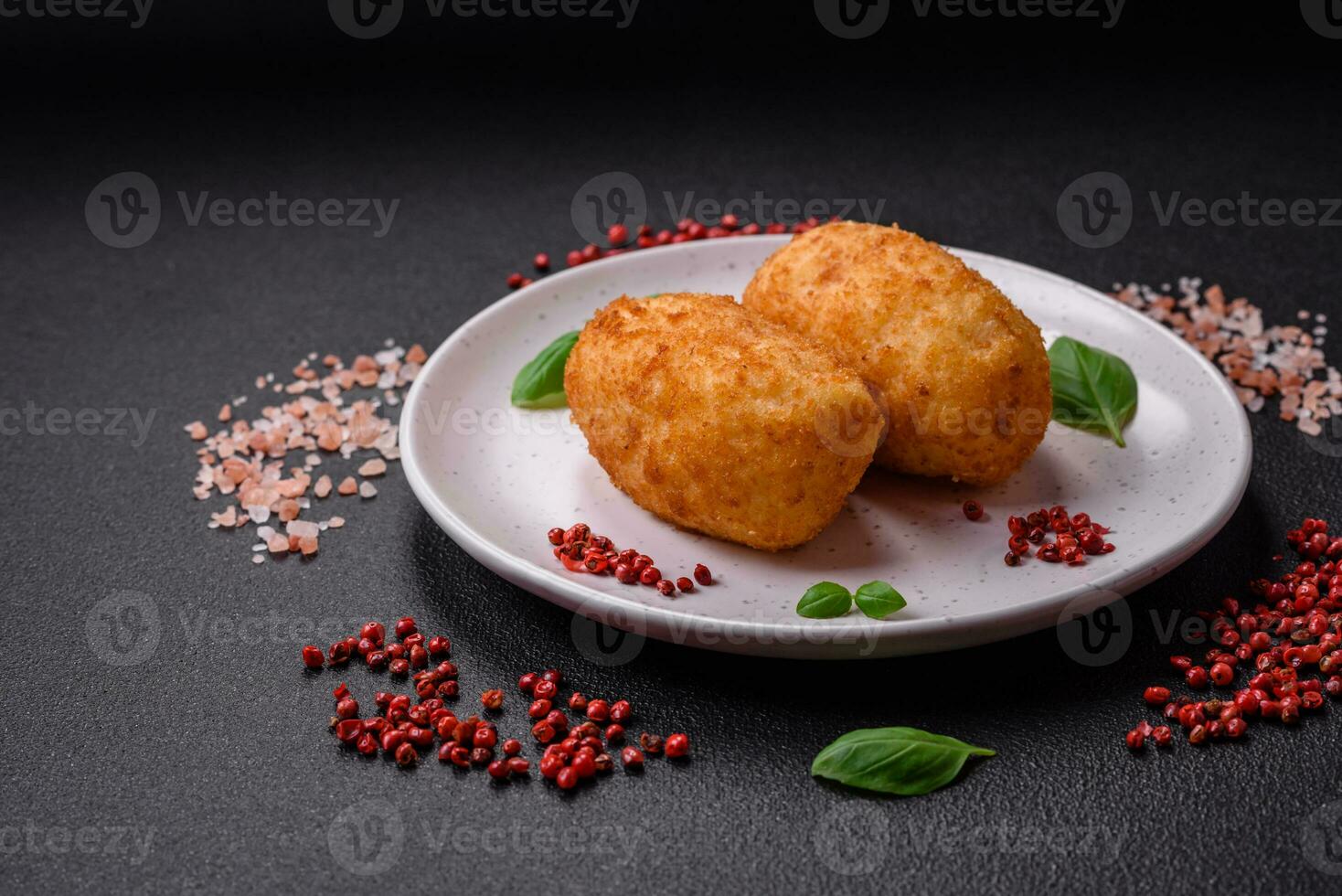 Delicious baked potato cutlet stuffed with chicken and vegetables, spices and salt photo
