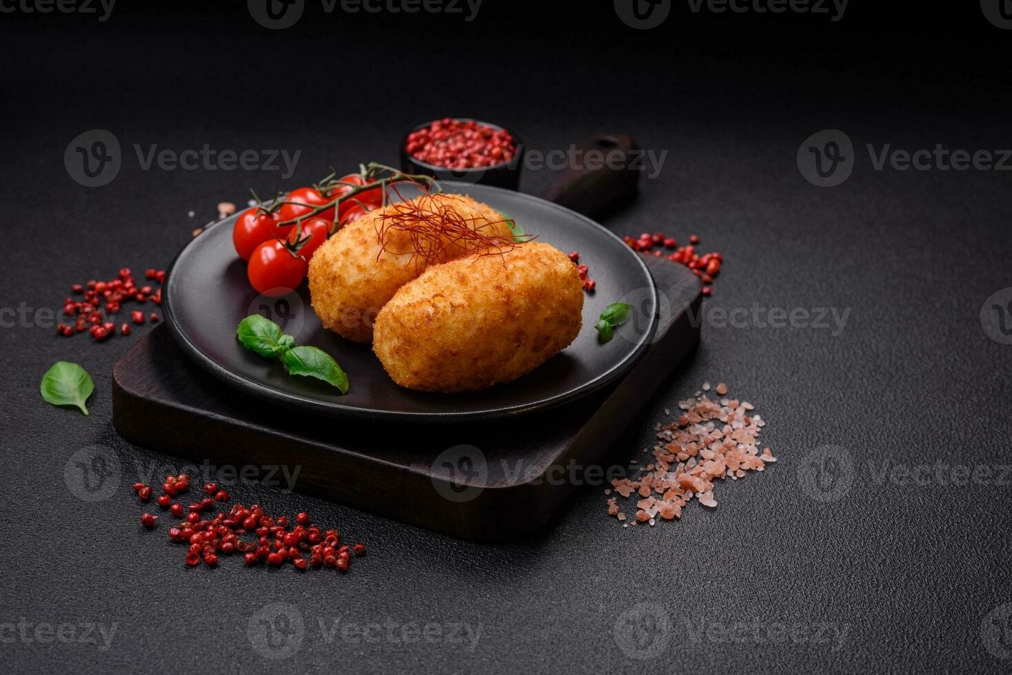 Delicious baked potato cutlet stuffed with chicken and vegetables, spices and salt photo