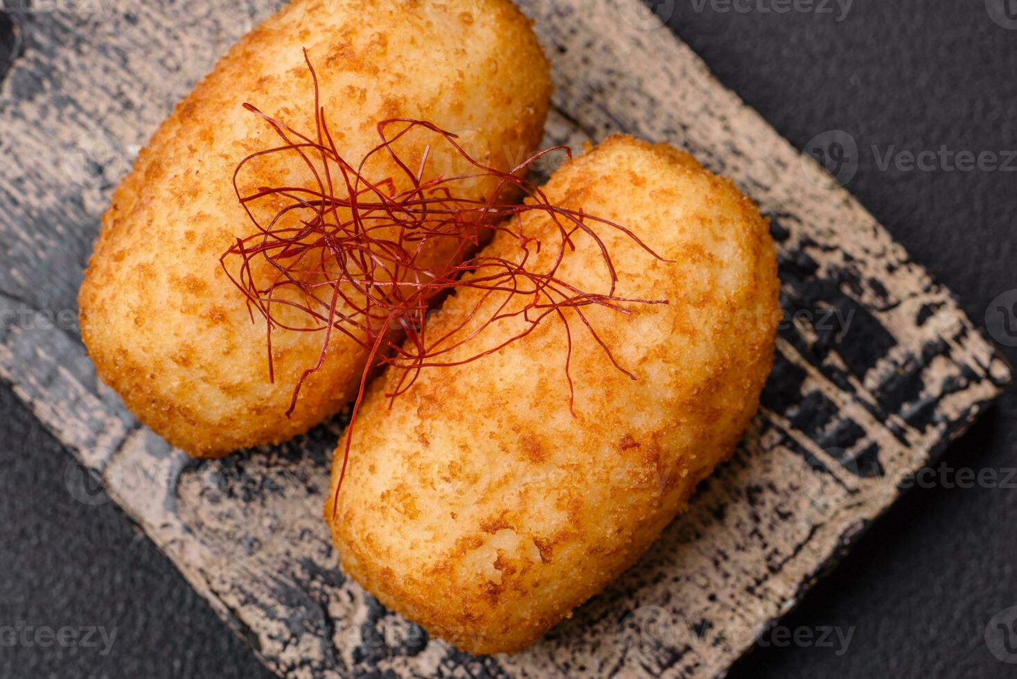 Delicious baked potato cutlet stuffed with chicken and vegetables, spices and salt photo
