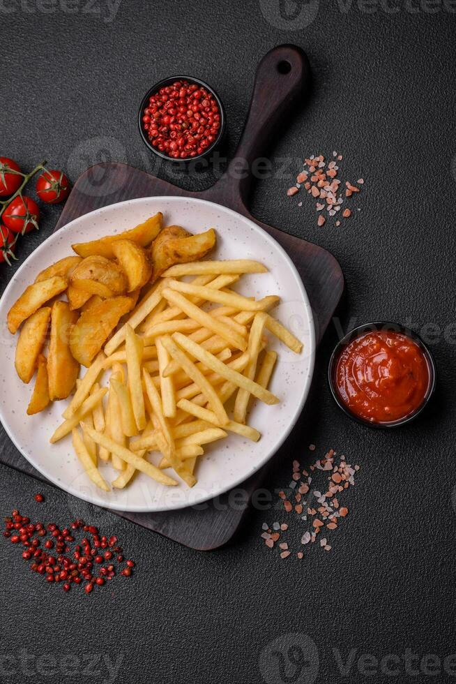 Fresh delicious crispy French fries with salt and spices photo