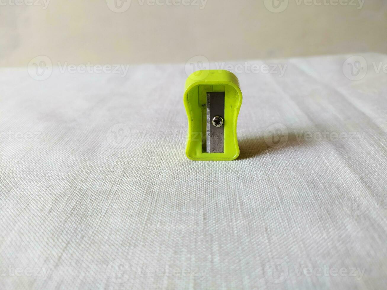 Sharpener was positioned on the table photo