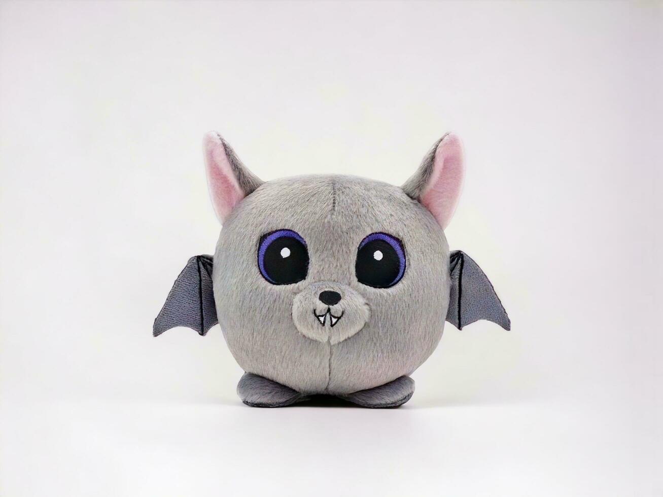 Cartoon bat doll on a white background photo