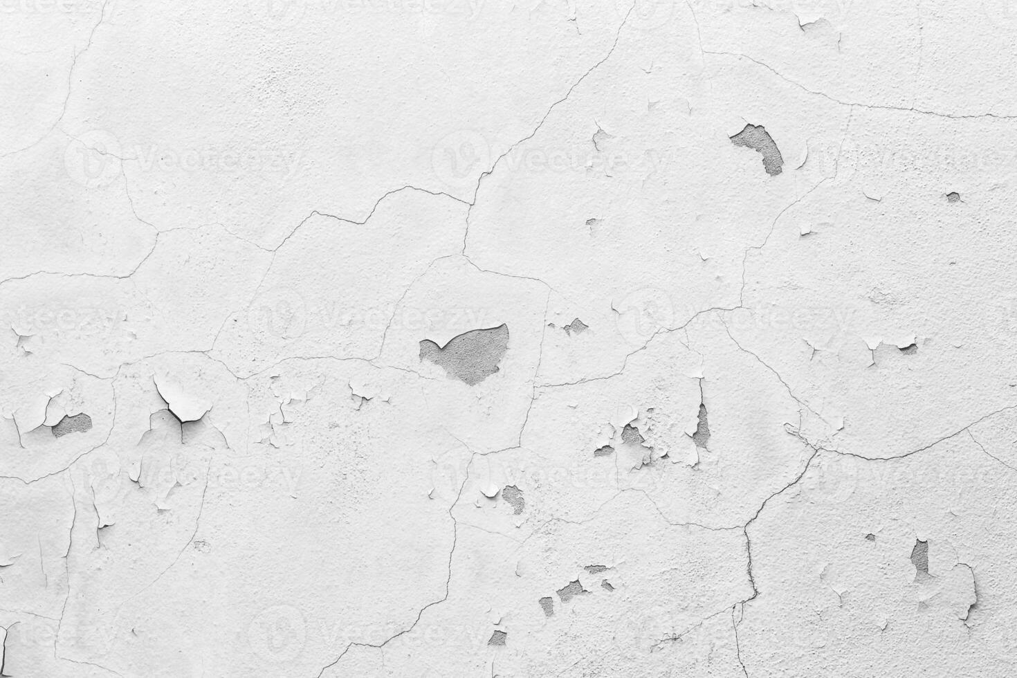 white wall with cracks photo