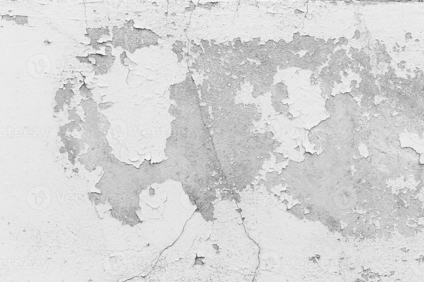 white wall with cracks photo