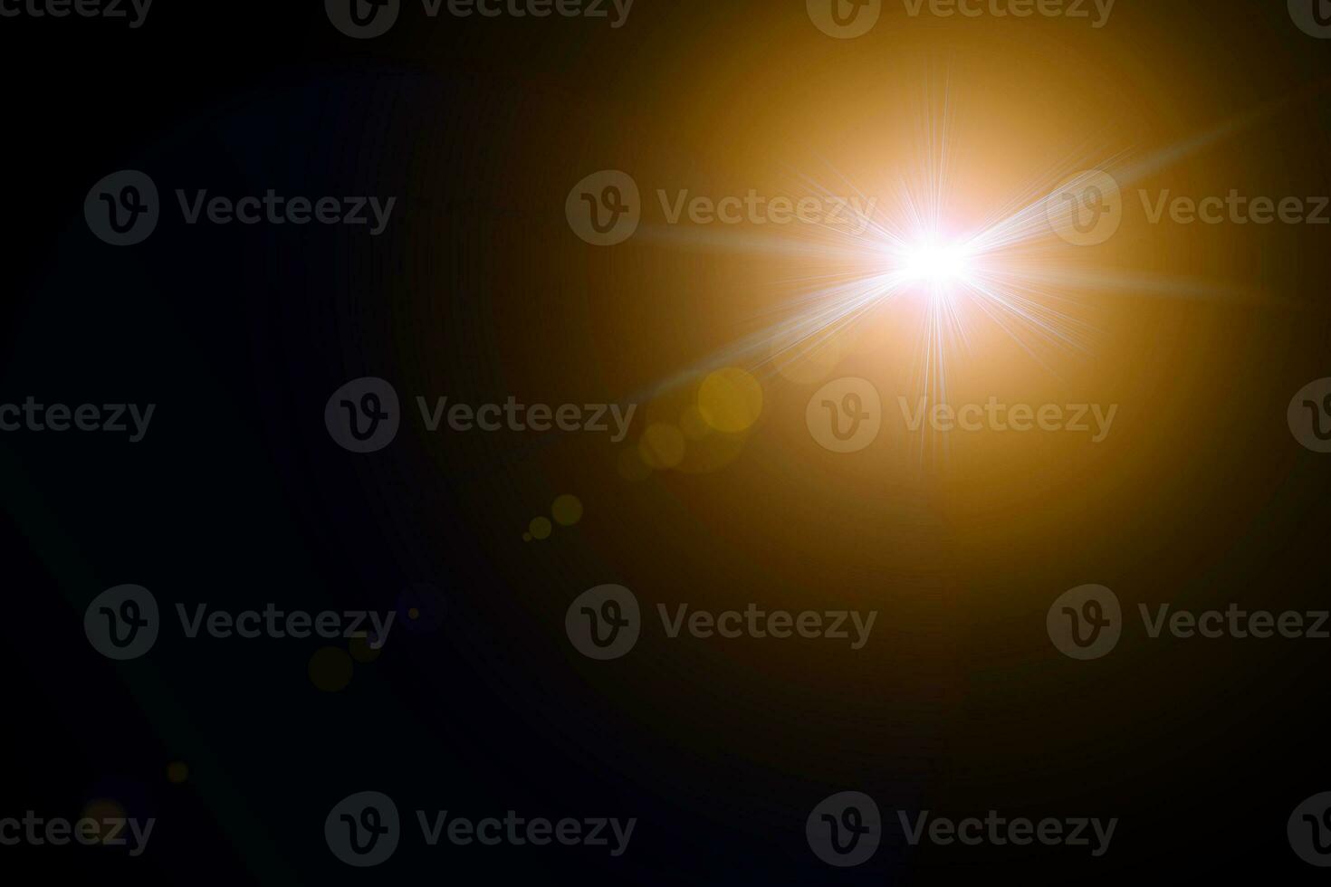 digital lens flare in black background horizontal frame warm photo
