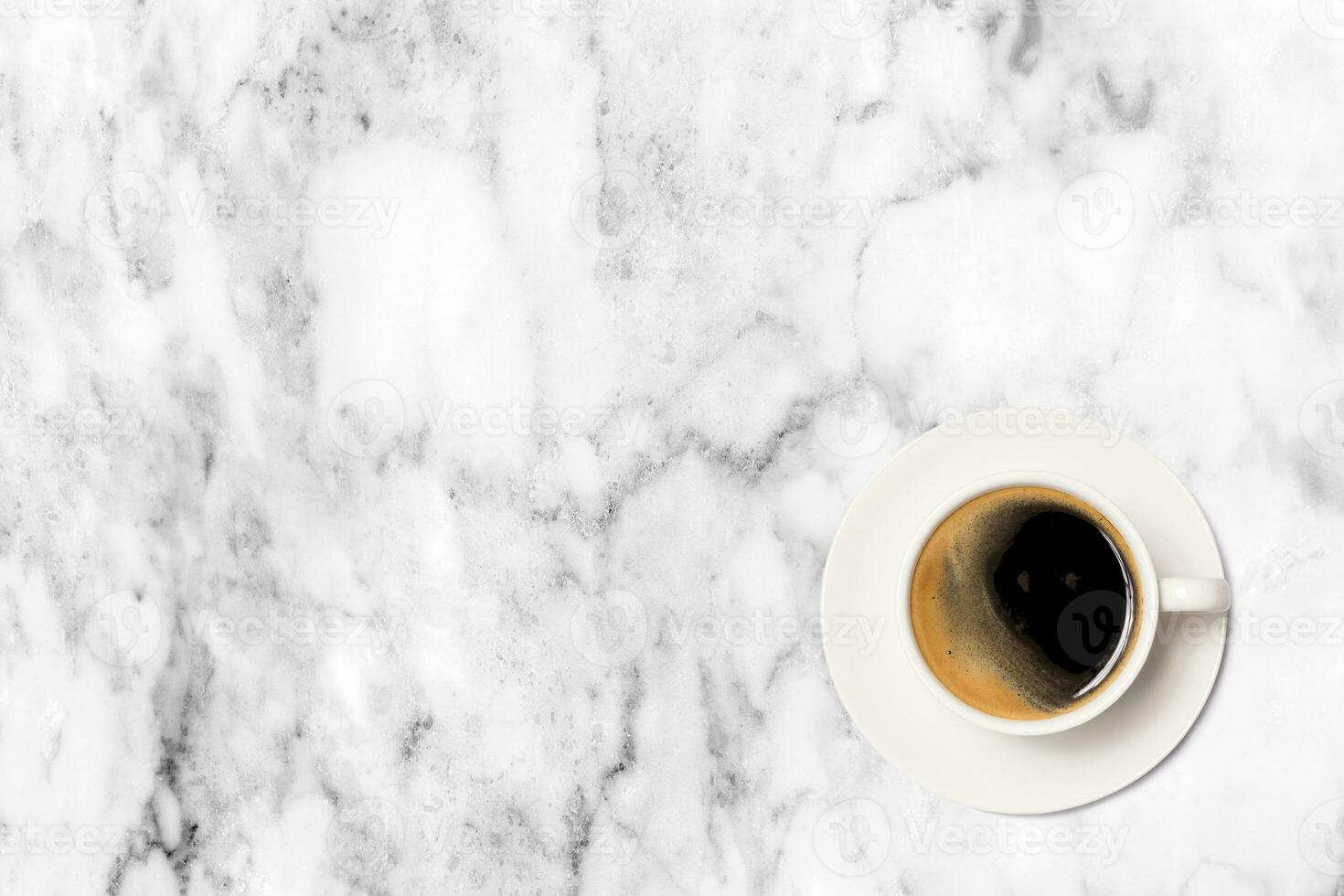 coffee cup on marble table background, top view. photo