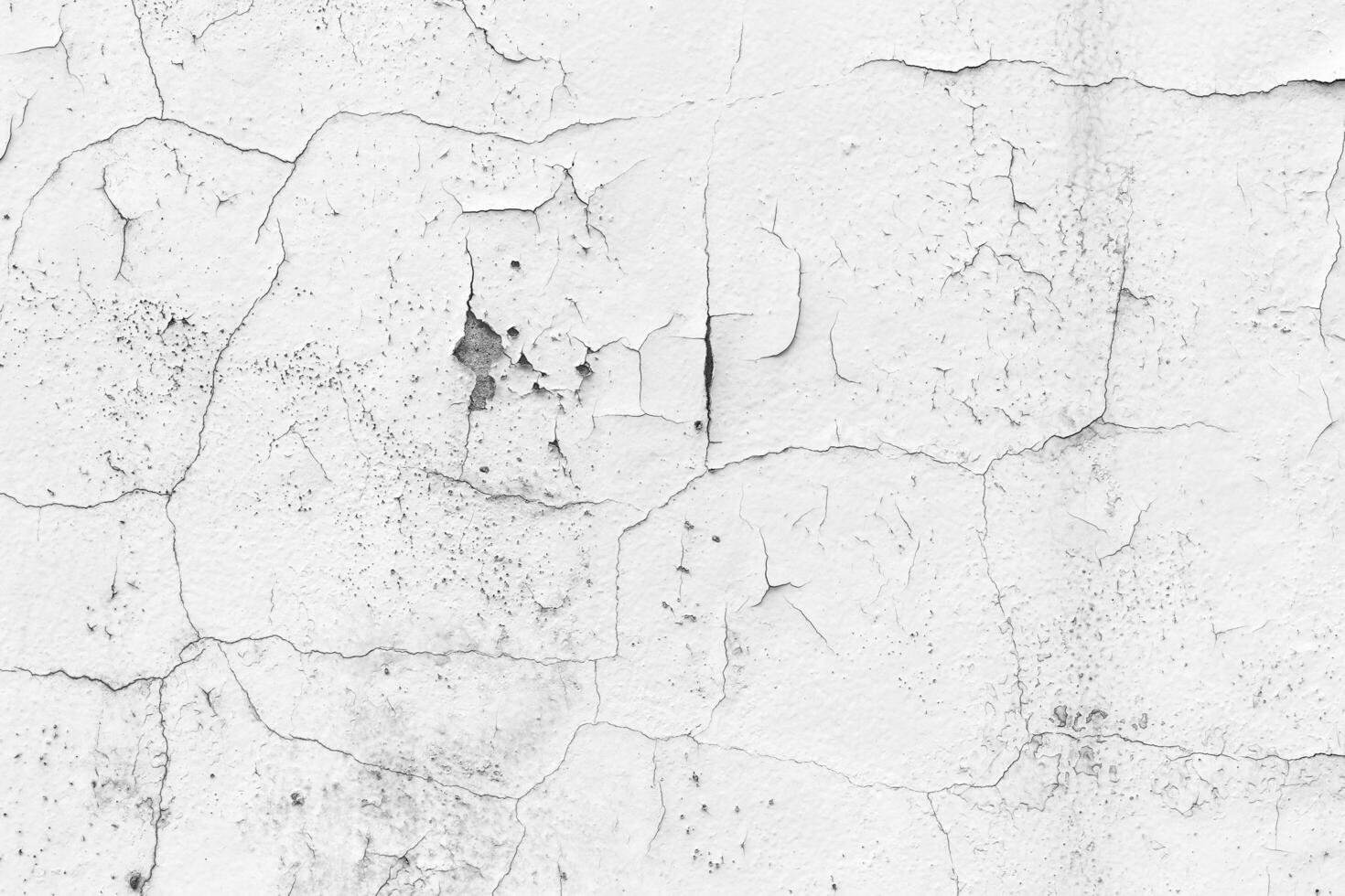 white wall with cracks photo