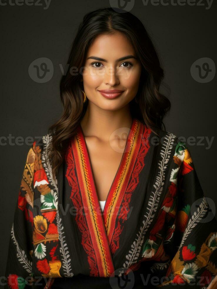 Smiling young woman of Mexican descent dressed in elegant dress on gray background AI Generative photo