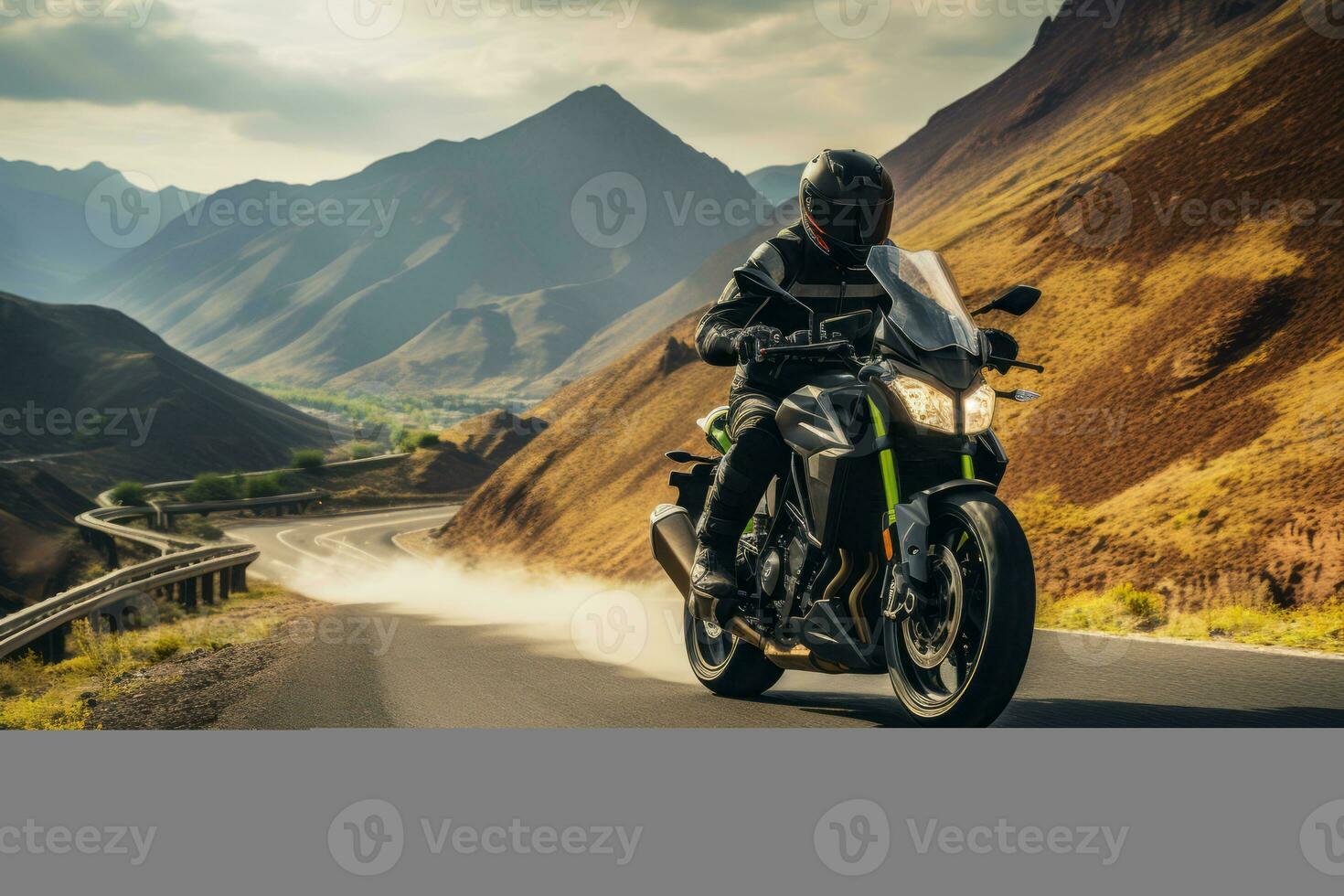 An image of a rider taking a motorcycle through a scenic mountain road, showcasing the harmony between man, machine, and nature. photo
