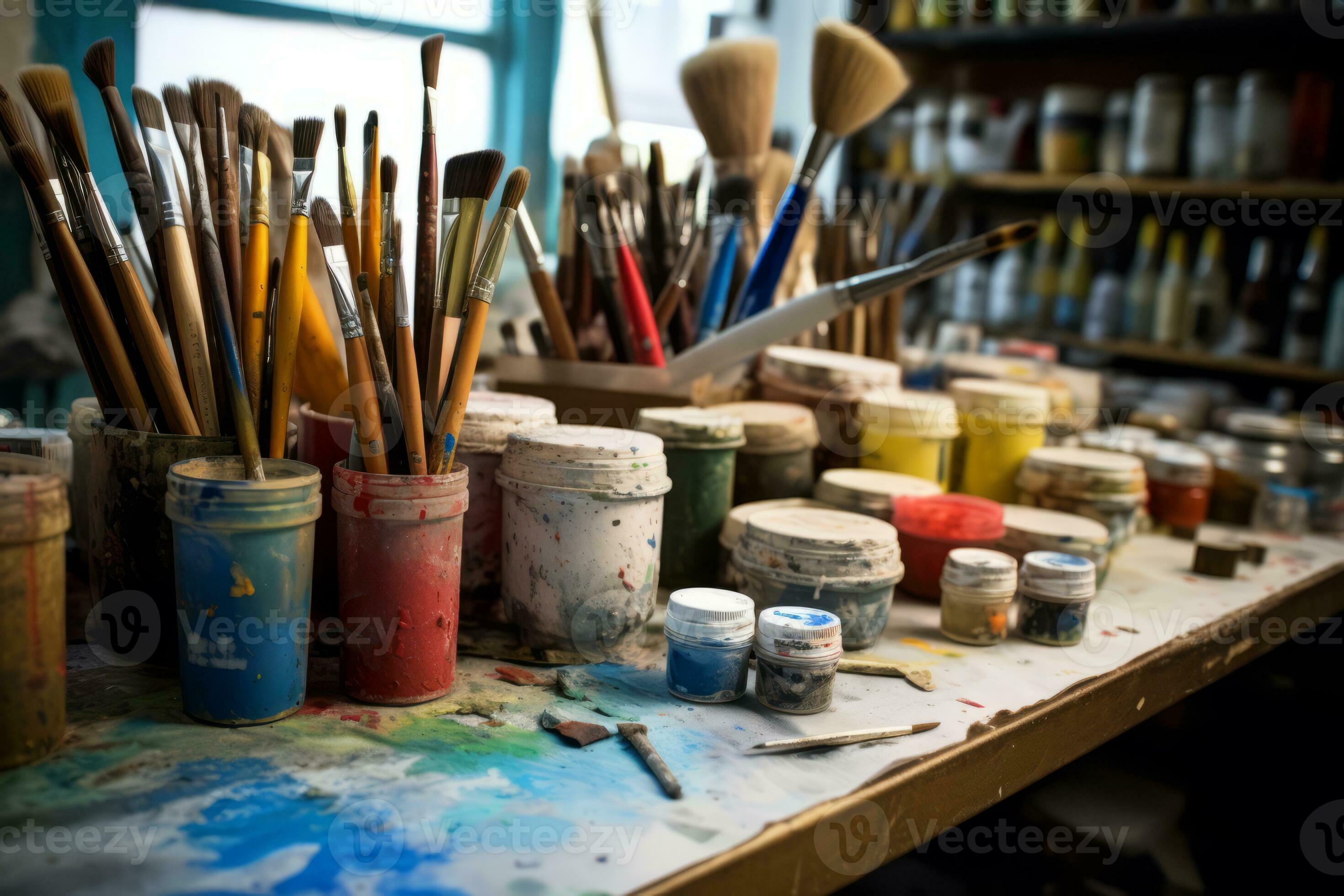 Collection of clean and paint brushes, rollers, and