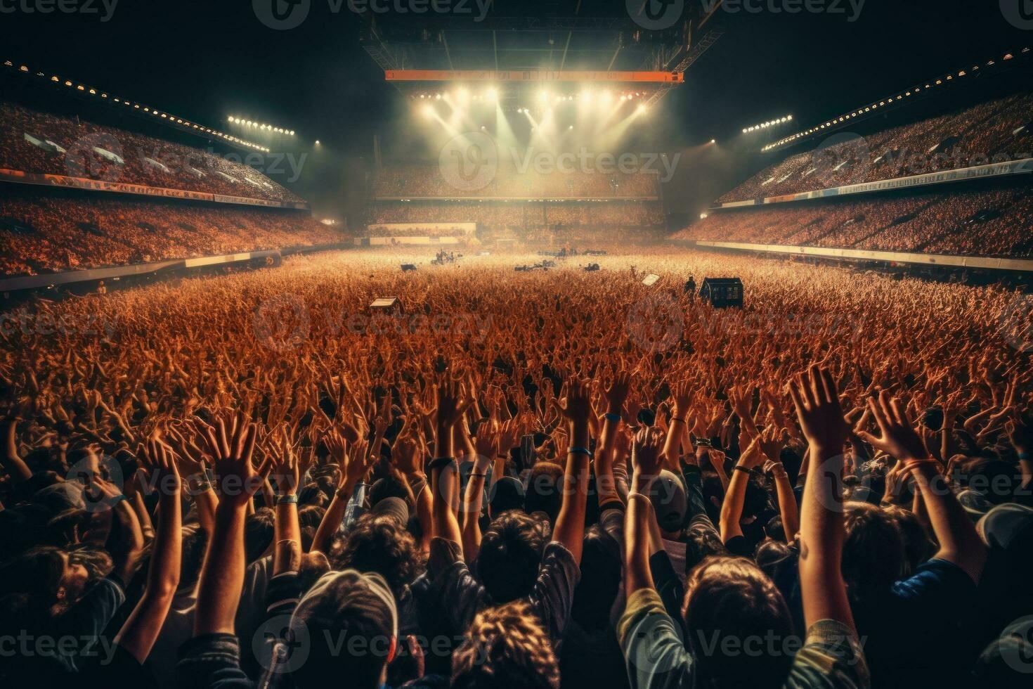 Wide-angle shot of a packed stadium during a concert with a sea of hands raised in the air. Generative Ai photo