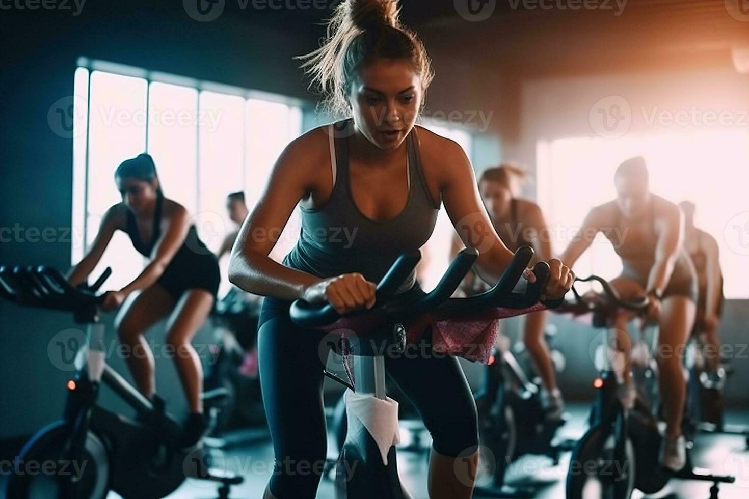 A motivational, group fitness class , featuring participants engaged in an energetic workout, such as spinning, aerobics, set against a vibrant, gym studio background. Generative AI photo