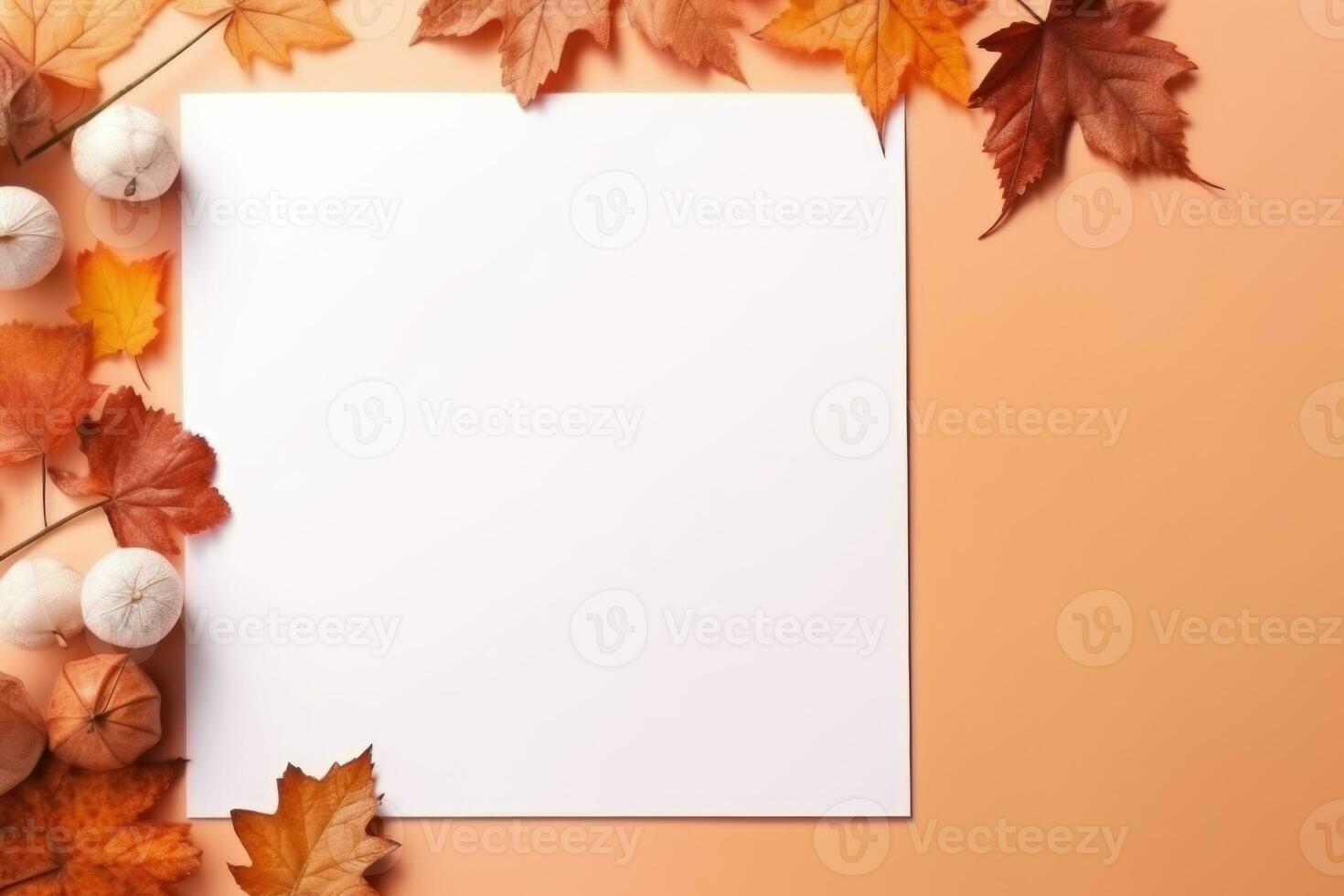 Autumn leaves on peach table, white sheet of paper. AI-Generated photo