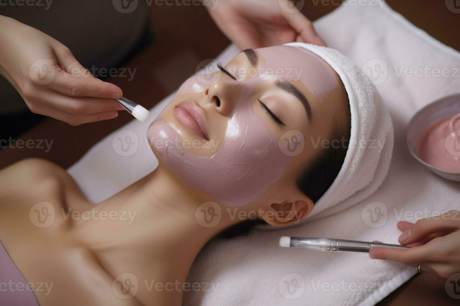 employee applying facial mask on young face Skincare in spa treatment . Spa and beauty concept.Created with Generative AI technology. photo