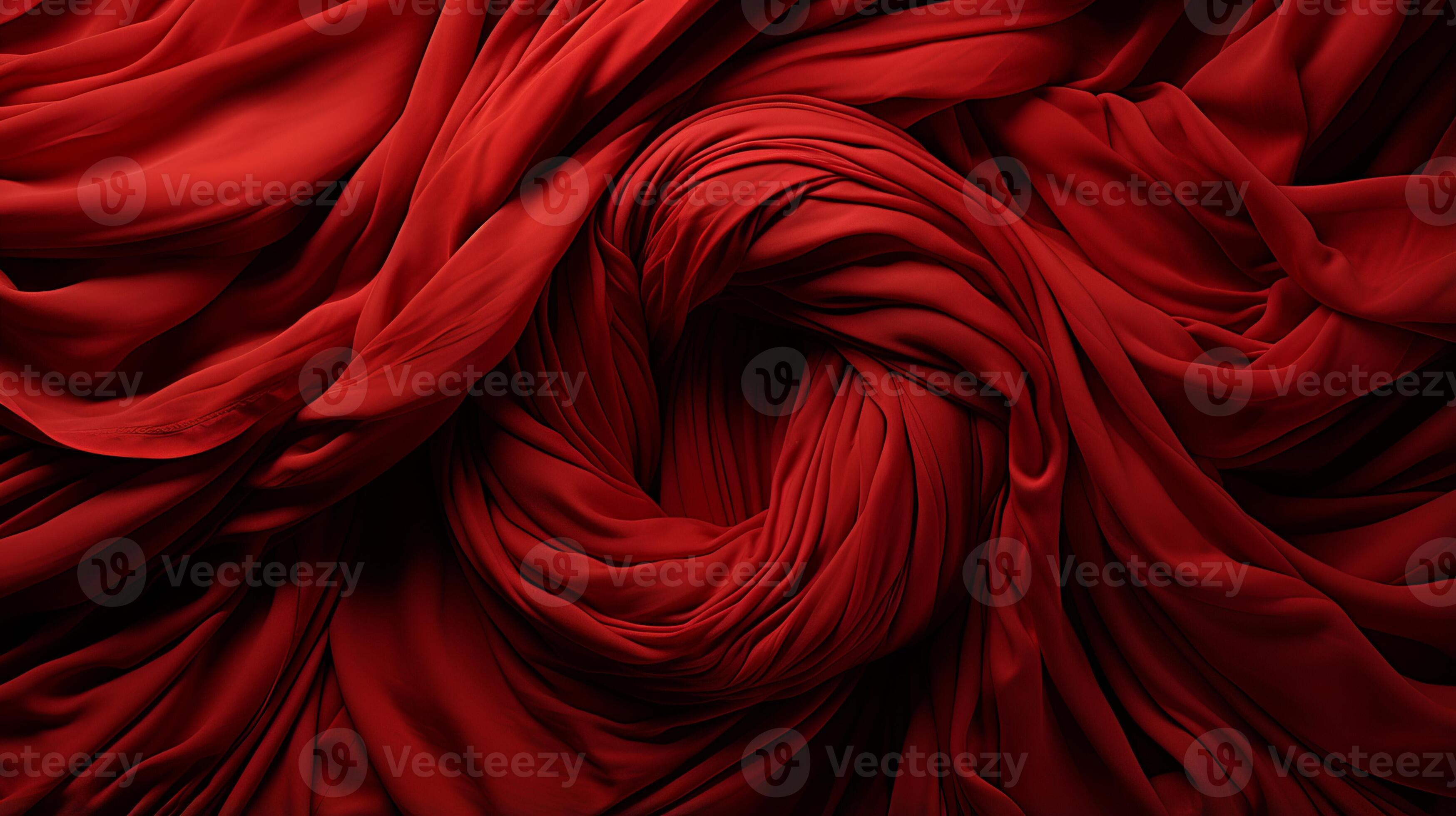A rich maroon fabric swirls and cascades creating a luxurious