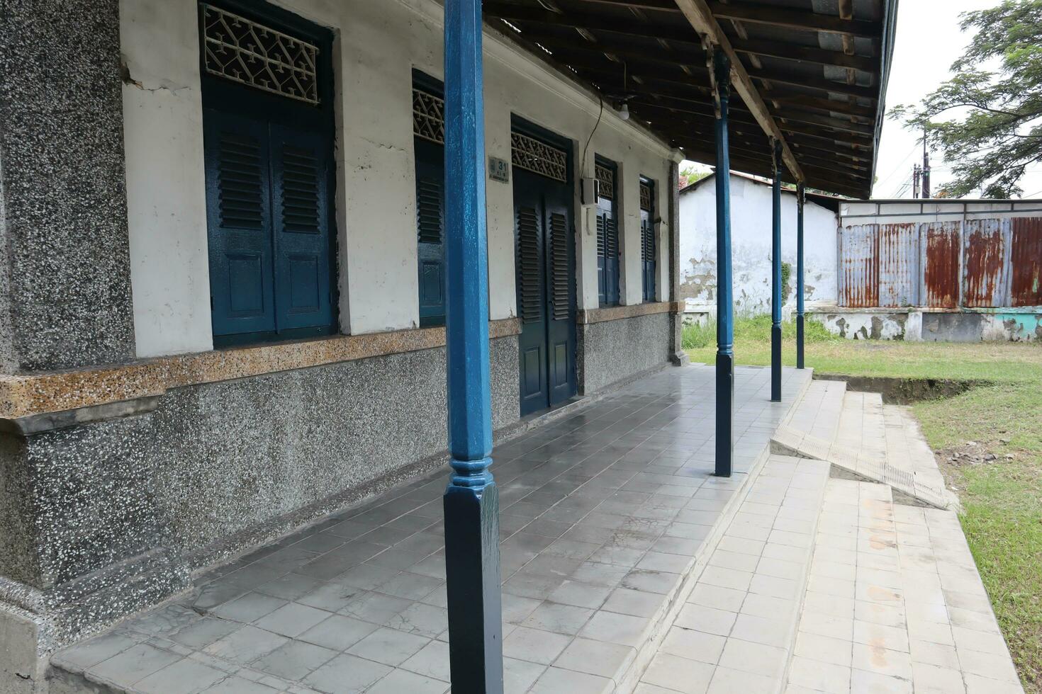 the front porch of the house with a vintage model photo