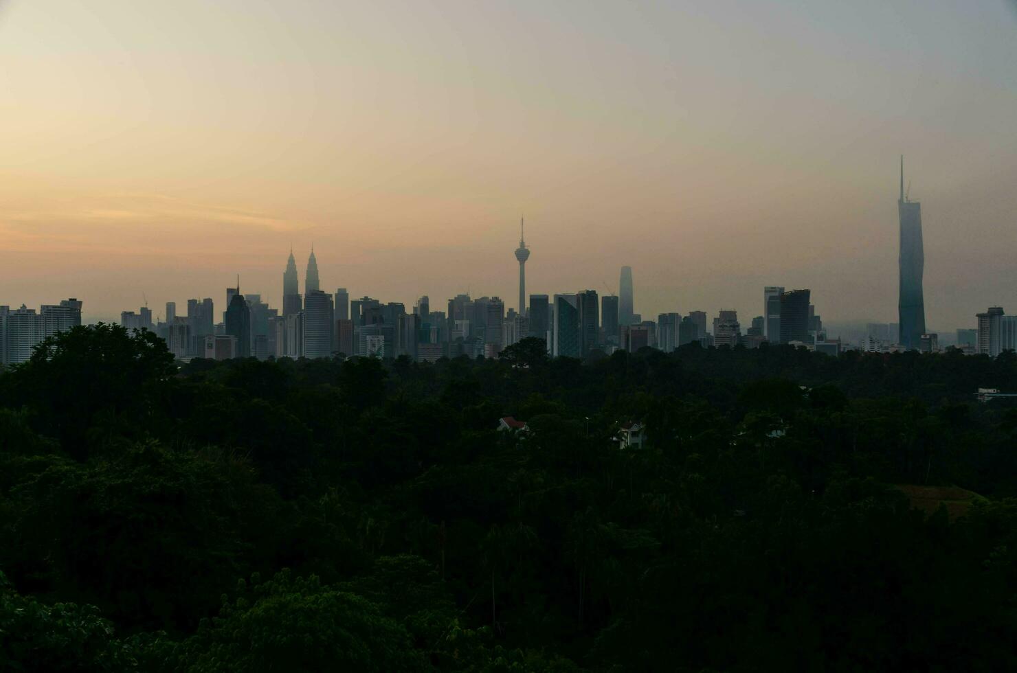 aerial landscape view of kuala lumpur city skyline with many skyscraper highrise building skyscrapers in the central business district of Malaysia.city skyline with skyscraper building photo