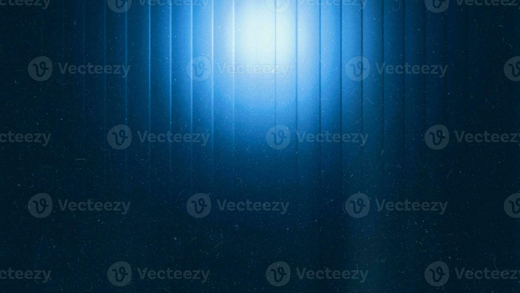 Crystal blurred blue gradient tones abstract on dark grainy background. Glowing light. Large banner. photo