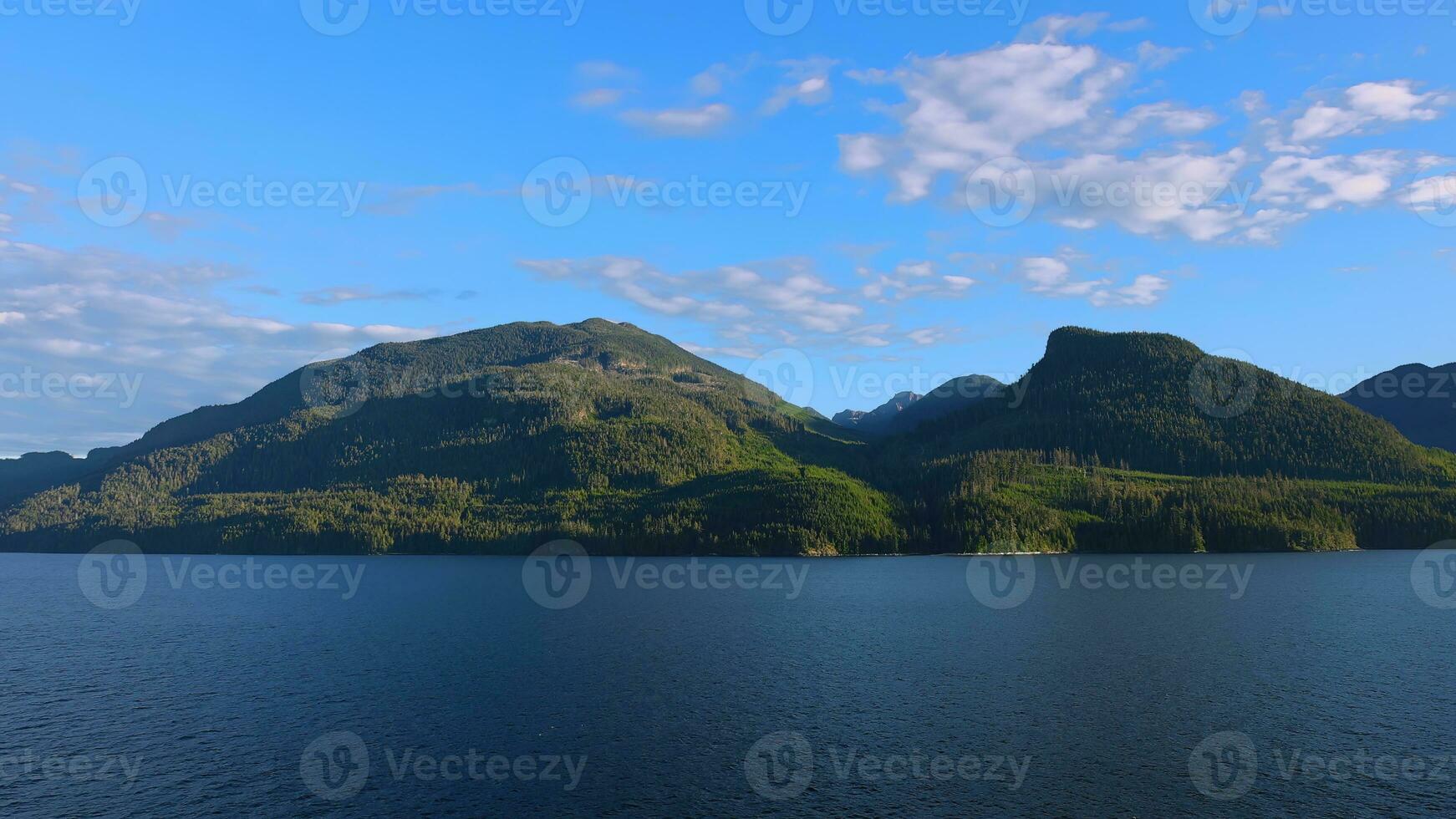 Cruise to Alaska, cruise ship sailing through scenic landscapes, mountains and lakes photo